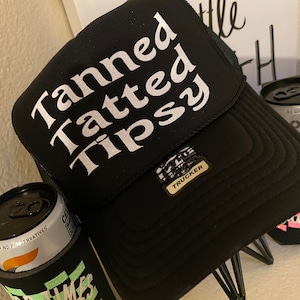 Tanned, tatted and tipsy