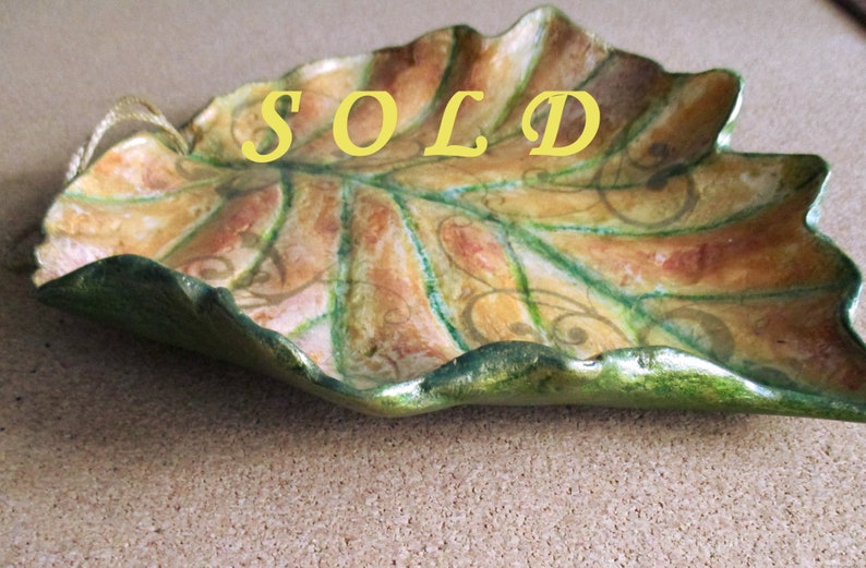 Another leaf shaped bowl in different colors, which is SOLD.