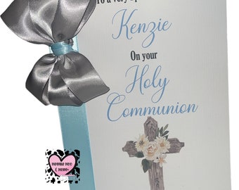 A5 Personalised, Holy Communion Card, comes with ribbon and bow for added keepsake value. Add name and date for the perfect keepsake card.