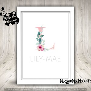 May include: A pink watercolor letter L with floral accents and green leaves. The name "LILY-MAE" is written in gray below the letter.