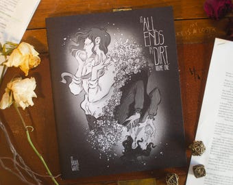 May include: A black and white illustration titled "It All Ends in Dirt, Volume One" featuring a figure surrounded by flowers. The artwork is on a dark background, with dried flowers and papers scattered around.