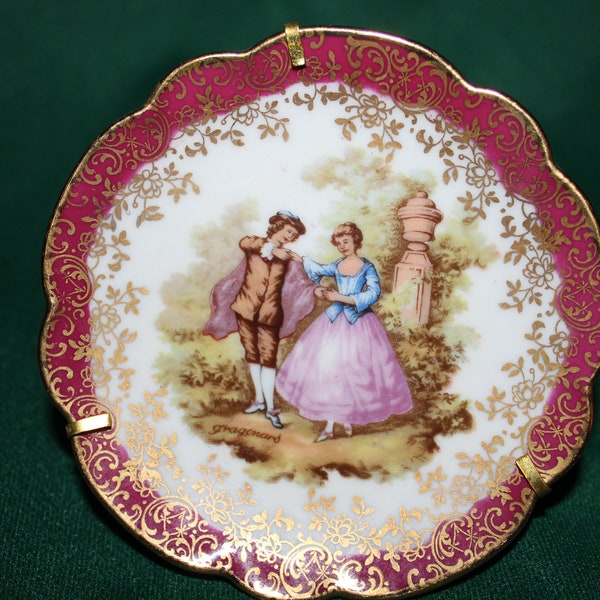 Signed Limoges Miniature Collector's Plate "Fragonard" The Courtship Scene Pink Edges Trimmed Throughout with Gold Leaves and Swirls