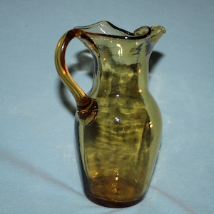 Antique Hand Blown Amber Glass Pitcher with Pinched Ice Lip 7.75&quot; Inches Holds 30 Fluid Ounces Perfect Condition Would Be a Beautiful Vase