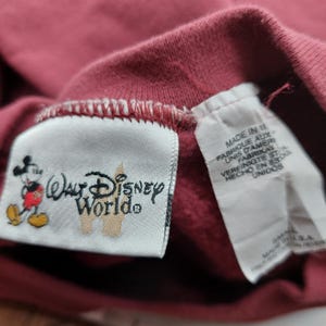 May include: A set of three ceramic mugs with a speckled, matte finish. The mugs are in shades of cream, light gray, and dark gray. Each mug has a simple, minimalist design, perfect for coffee or tea.