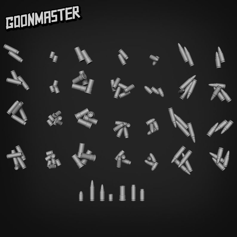 May include: A collection of silver-colored bullet casings scattered on a black background. The casings are arranged in various groups and orientations, with some stacked on top of each other. The word "GOONMASTER" is printed in white letters on a black background at the top of the image.