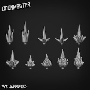 May include: Ten 3D printed models of different styles of spikes, all in a grey colour. The models are pre-supported and ready to be printed.