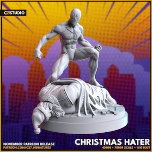 以下が含まれることがあります： 白い3Dプリントされたスパイダーマンのミニチュアが、倒れたサンタクロースの上に立っています。ミニチュアは40mmと75mmのスケールで、1/10の胸像が含まれています。ミニチュアのベースには「Christmas Hater」というテキストが印刷されています。