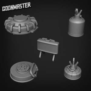 Puede incluir: Una colección de modelos grises renderizados en 3D de varias minas terrestres. La imagen incluye diferentes formas y tamaños, como diseños circulares, cilíndricos y rectangulares. El texto "GOONMASTER" está en la esquina superior izquierda.