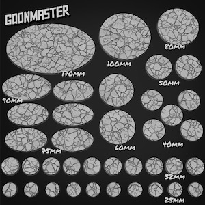 May include: A selection of grey, cracked-stone textured bases in various shapes and sizes. The bases range from 25mm to 170mm in diameter, with oval and circular shapes. The text "GOONMASTER" is at the top.