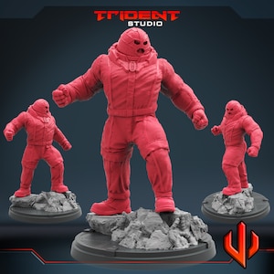 May include: Three red plastic figurines of the Marvel Comics character, The Juggernaut. The figurines are posed in different action stances. The largest figurine is in the center and is standing with one leg forward. The other two figurines are smaller and are standing with their legs apart. The figurines are all on a gray rocky base.