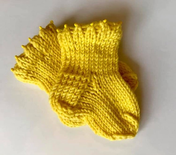 socks on baby at night