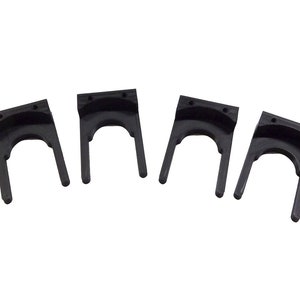 May include: Four black plastic clips with a U-shaped opening. The clips are designed to hold objects in place.