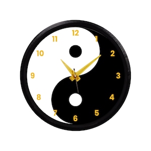 May include: A round wall clock with a black frame and a yin-yang design. The clock face is divided into black and white sections, with gold-colored hands and yellow numerals. The clock measures approximately 12 inches in diameter.