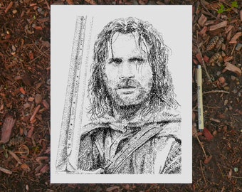 May include: A black and white drawing of a man's face, created using words. The man has long hair and is wearing a cloak. The drawing is on a white background.