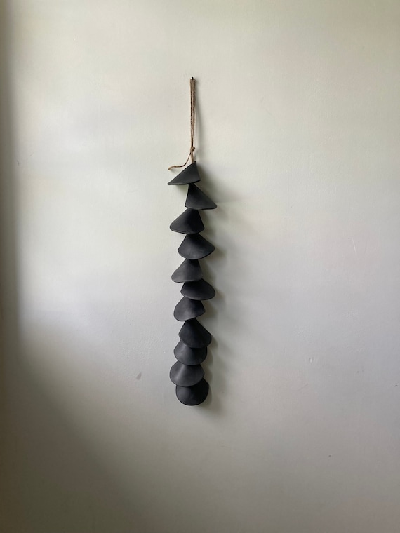 Handmade Matte Black Ceramic Wall Hanging: Minimalist Artisan Decor