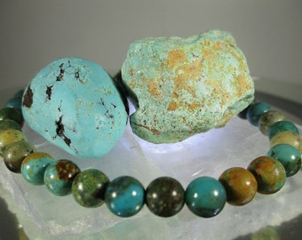 6mm Turquoise Bead Bracelet. 7.5 inches.