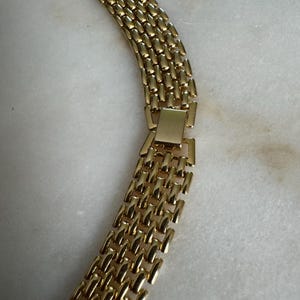 Gold-Tone Interlocking Chain Design Lettered Detailing Adjustable Length Clasp Fastening main image 1