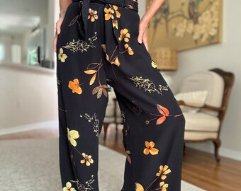 Pantaloni neri svasati a vita alta vintage CACHE Rayon floreali