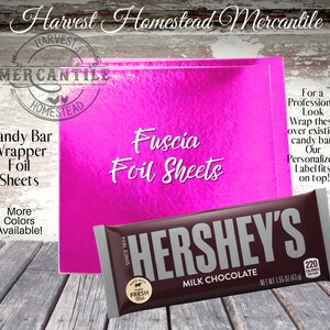 May include: Fuschia foil sheets for wrapping candy bars. The image shows a Hershey's chocolate bar wrapped in fuschia foil. The text "Fuscia Foil Sheets" is printed on the foil. The text "For a Professional Look Wrap these over existing candy bar. Our Personalized Label fits on top!" is printed on the right side of the image.