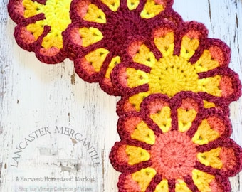 set 4 Hand Crocheted flower Coasters, Umbré Yellows, Orange, Red