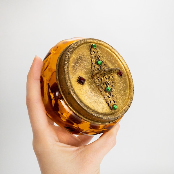 Antique 24k Gold Plated Large Amber Glass Powder Vanity Jar with Red & Green Paste Gems on Floral Art Nouveau Filigree ca. 1920s or 1930s