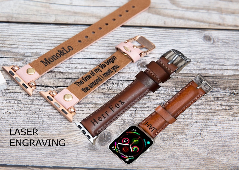 May include: Three personalized leather watch bands for Apple Watch. The bands are brown and feature laser engraved text: "Mono&Lo", "The time of my life began the second I meet you." and "Herr Fox".