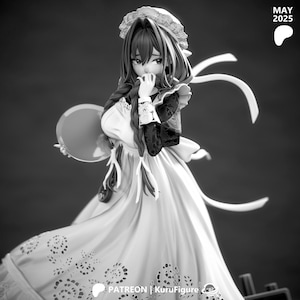 May include: A black and white anime-style figurine of a character wearing a maid outfit with a ruffled apron, long braided hair, and a headpiece. The character holds a circular tray and has a pocket watch attached to the waist. Text reads MAY 2025.