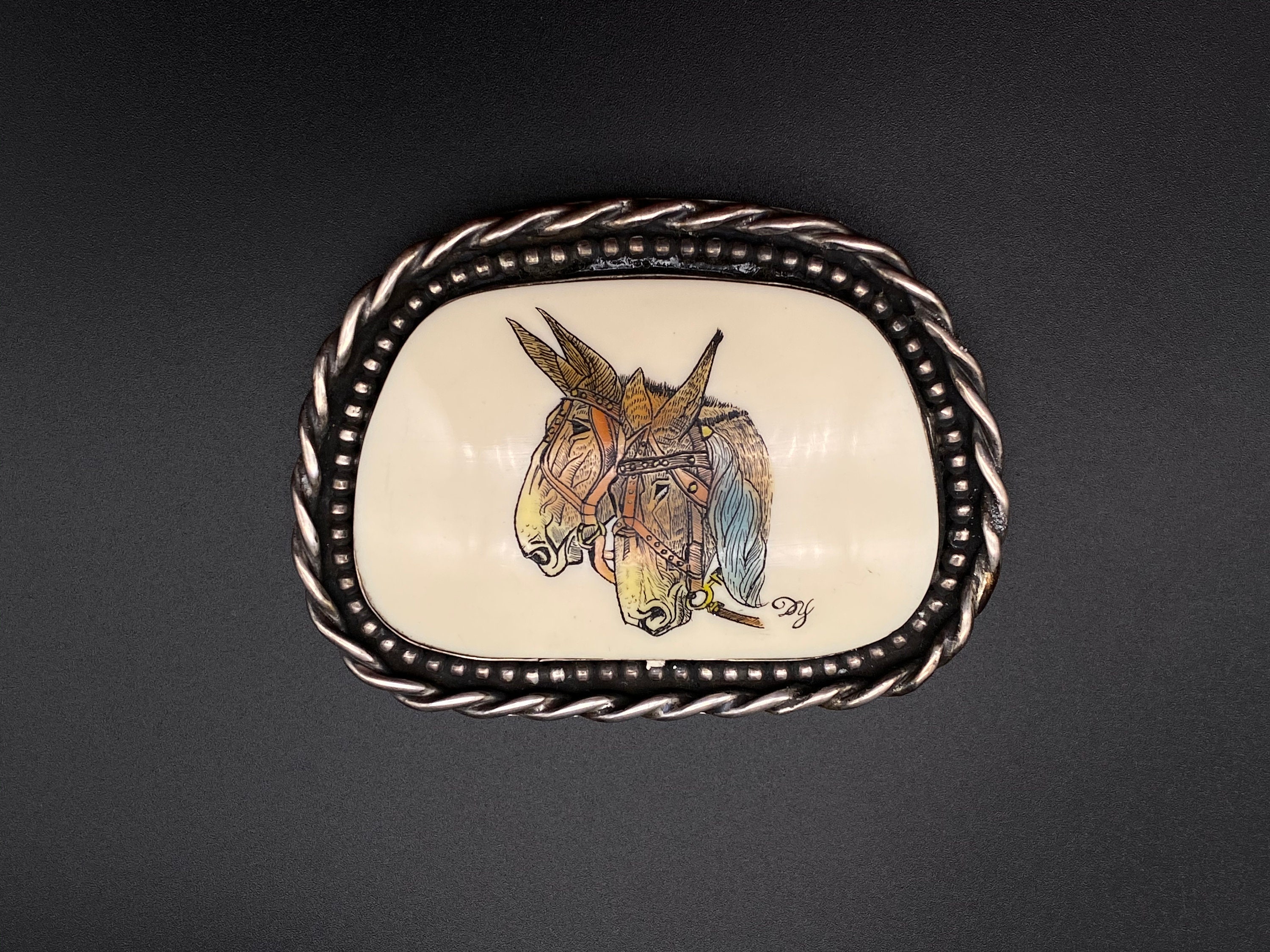 mule belt buckle
