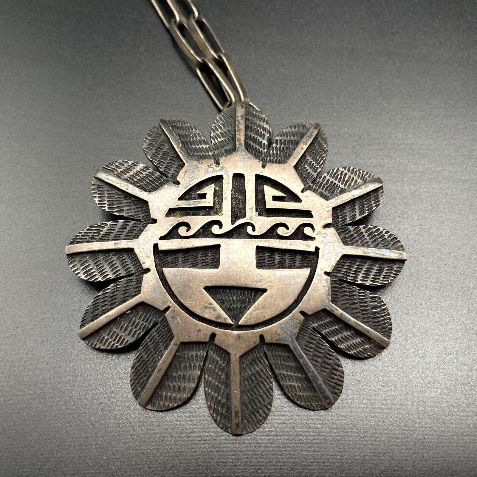 Wonderful 1980s-90s Hopi Silver Overlay Sun Face Bracelet by
