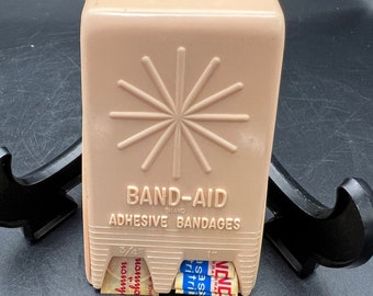 Vintage Wall Band-Aid Dispenser 1950's Starburst Front