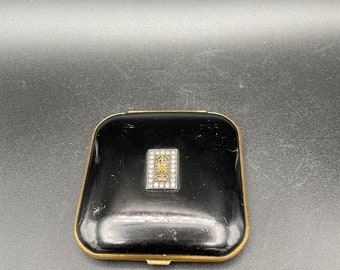 Black Metal Mondaine Compact with Gold Insert Surround by Rhinestones