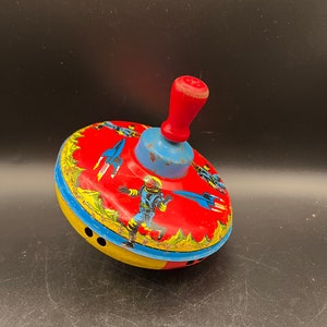 Tin Litho Spaceship Top Rocket Ship Astronaut Spinning Top Wooden Handle