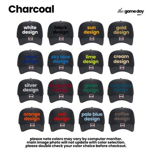 a collection of black baseball caps with various color designs, including white, black, gold, and lime.