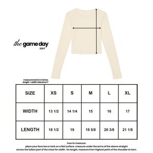 The image is a size chart for a long-sleeved shirt, providing measurements for different sizes (XS, S, M, L, XL) and corresponding widths (13, 14, 15, 16, 17). The chart also includes instructions on how to measure the shirt under the arms of the sleeve to determine the length.