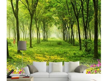 May include: A white couch with gray pillows sits in front of a green forest scene with a path leading into the woods. The forest scene is a wall mural with a realistic depiction of trees and foliage.