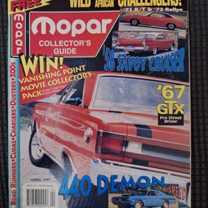 May include: A Mopar Collector's Guide magazine from April 1997 featuring a red 1967 GTX on the cover. The cover includes text about a Vanishing Point movie collector's pack, a blue 440 Demon, and a red 1958 Savoy Cruiser with a barcode at the bottom.