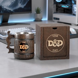 May include: A dark brown wooden beer mug with a metallic interior and a decorative handle, featuring a circular emblem with the text "YOUR D&D TEXT". Beside it sits a matching square wooden box engraved with the same circular "YOUR D&D TEXT" logo.