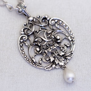 26 inch, Vintage Silver Tone Medieval Abstract Coat of Arms Pendant Necklace by Avon - L1