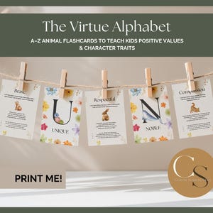 May include: A set of educational flashcards for children, featuring the text "The Virtue Alphabet" and "A-Z Animal Flashcards to Teach Kids Positive Values & Character Traits." The cards are displayed on a string with wooden clips. Each card has a virtue and an animal illustration.