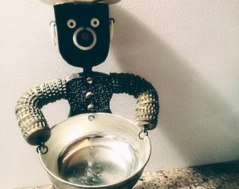 THE OFFERING. 14 inches tall. Original Art. Bottle cap sculpture with 2 offering bowls.
