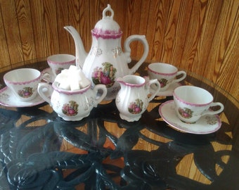 French Rococo Romance tea set. full service set, porcelain gold and raspberry accents on white, courtship couple