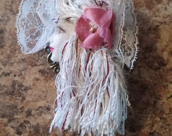 BOHO GYPSY brooch. Feminine and alluring wardrobe accessory. Lace hair fan. Flower. Platinum blonde. Blond. Stevie Nicks look. Music maker