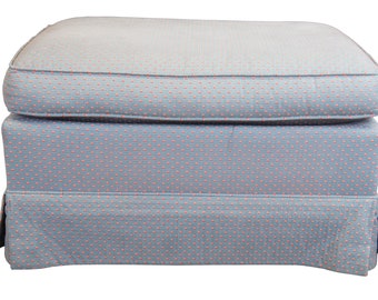 May include: A blue and pink patterned fabric ottoman with a tufted top.