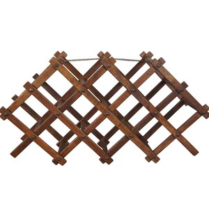May include: A wooden wine rack with a diamond pattern and a metal chain. The rack is made of dark brown wood and has a rustic look.