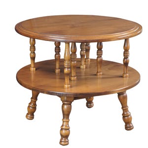 May include: A two-tiered, round wooden table with a warm brown finish. The table features a top and bottom tier connected by turned spindles. The legs are also turned, adding to the table's classic design. A decorative piece for any living space.