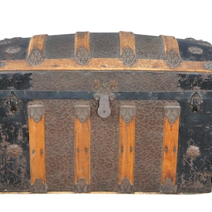 May include: An antique trunk with a domed top. The trunk is black with brown and tan accents, metal hardware, and wooden slats. The trunk has a textured surface and a metal clasp.