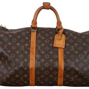 LOUIS VUITTON, YELLOW MONOGRAM KEEPALL BANDOULÍÈRE 50 IN EMBROIDERED MESH  AND LEATHER WITH SILVER TONE HARDWARE, Handbags & Accessories, 2020