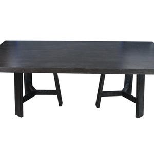 May include: A rectangular dark gray wooden dining table with four dark gray legs. The table has a simple, modern design, suitable for a dining room or kitchen. The table is set against a white background.