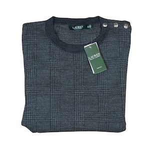 May include: A gray and black plaid sweater with a crew neck and button detail. The sweater has a green label that reads "LAUREN RALPH LAUREN".