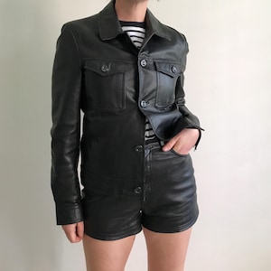Veste en cuir noir vintage des années 70 fabriquée en Angleterre